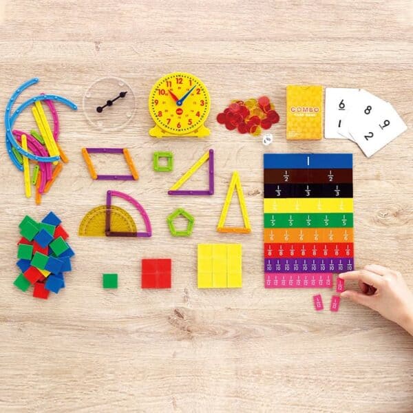 a child's hand holding a colorful math puzzle