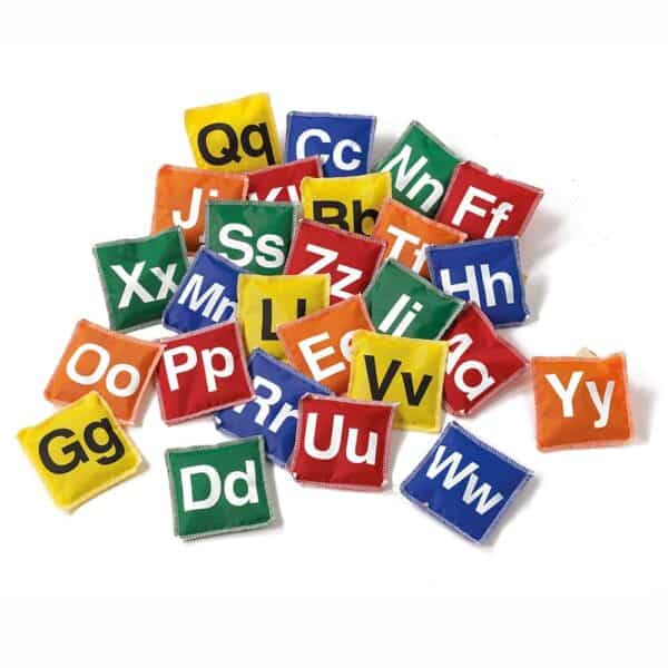 a pile of colorful square pillows with letters