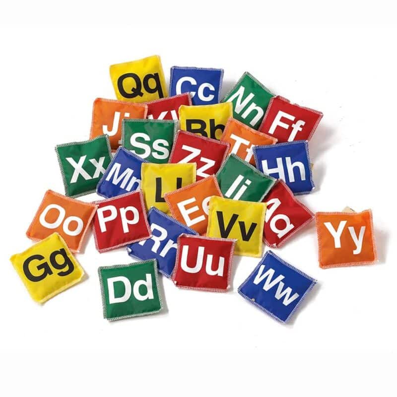A pile of colorful square pillows with letters