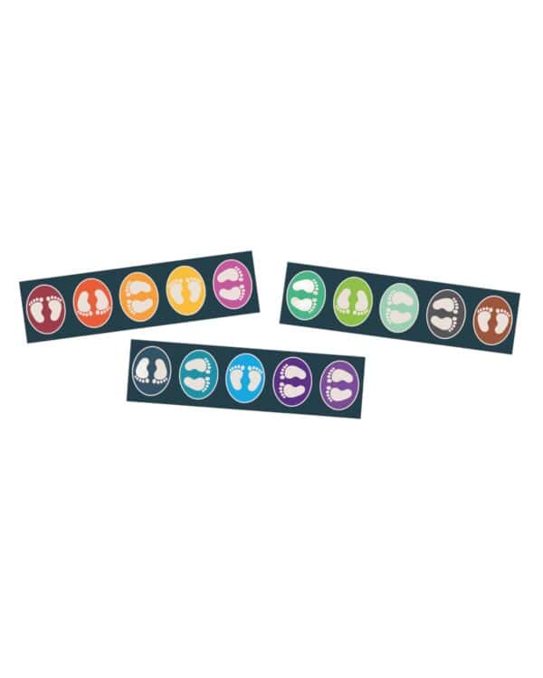 a group of colorful labels with footprints