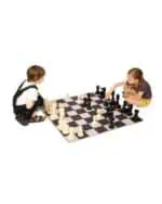 a boy and girl playing chess
