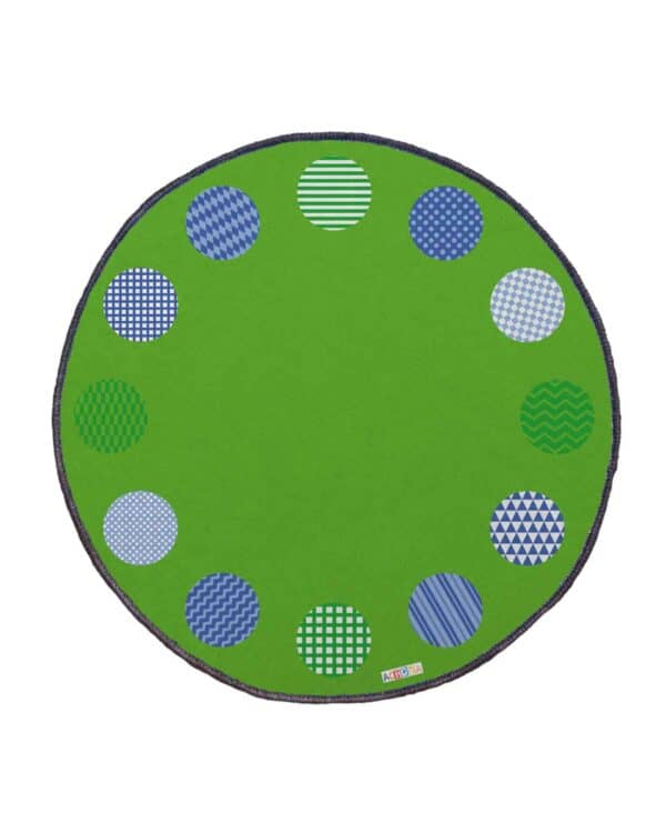 a green rug with blue and white circles