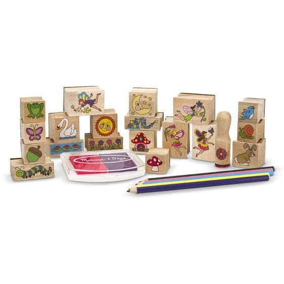 Colorful wooden stamps and art supplies