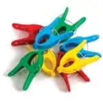 a group of colorful clothespins