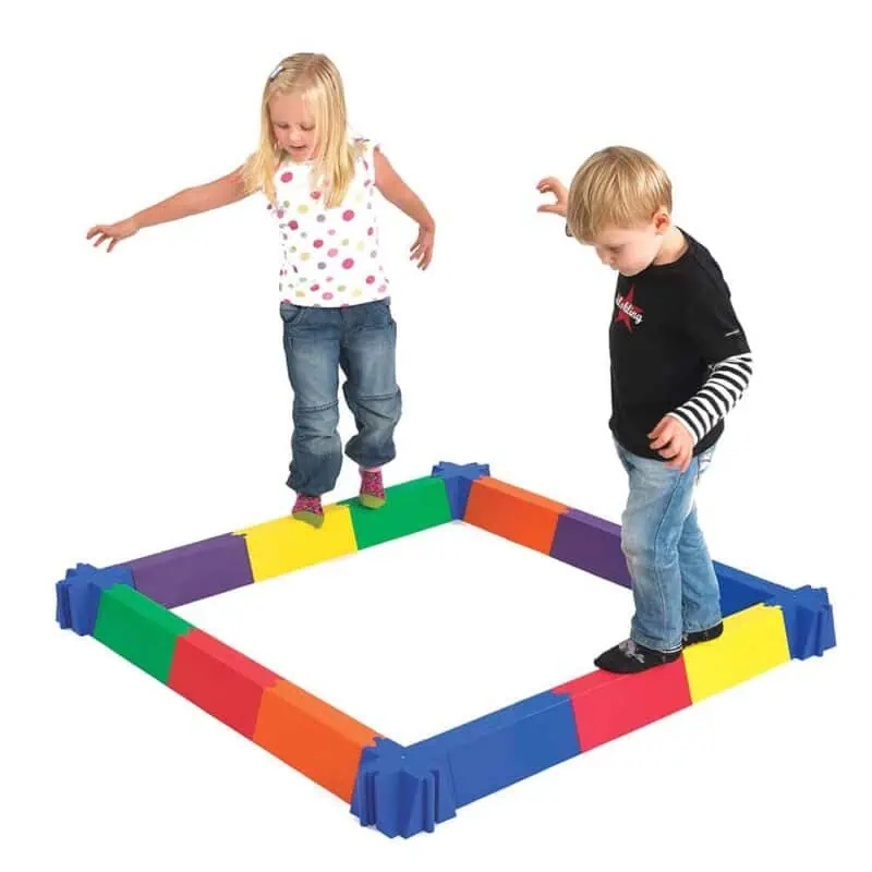 A boy and girl standing on a square