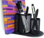 a pen holder with pens in it