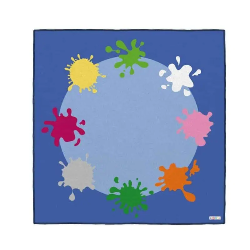 A blue rug with colorful splatters